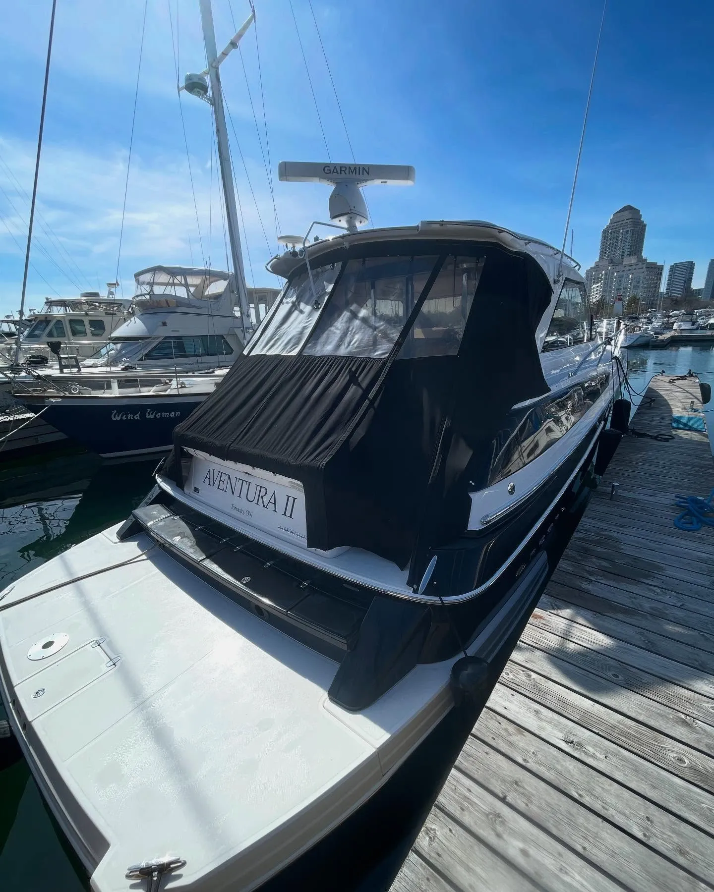 Cabin cruiser detailed at the dock